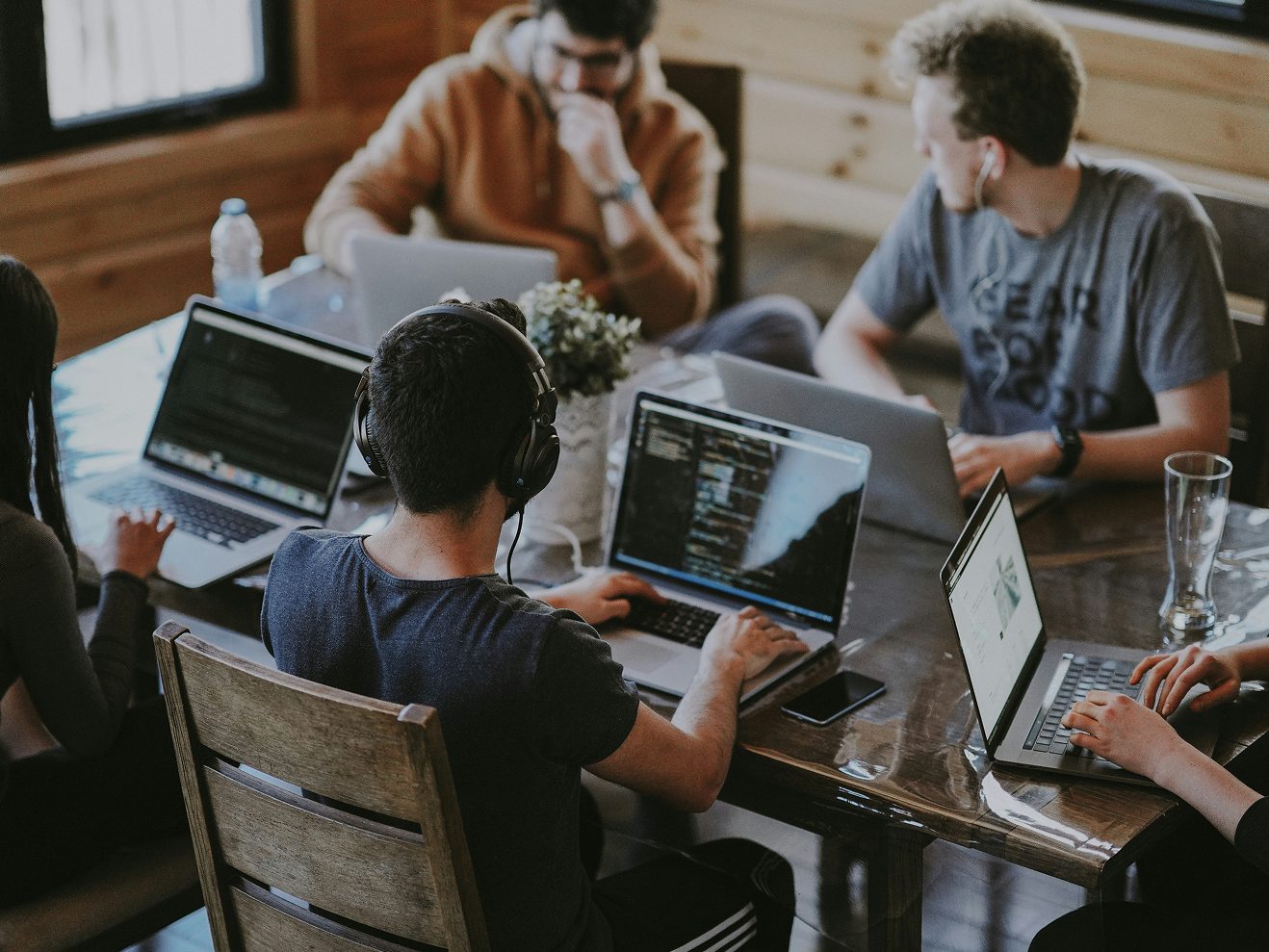 Marketing team reviewing paid advertising performance in a meeting